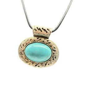 Elegant Silver and Turquoise Pendant Necklace